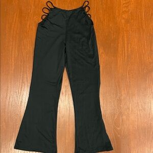 Chic Black Flare Pants with Unique Side Detailing
